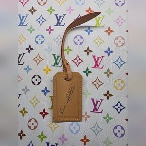 Louis Vuitton NeverFull MM Luggage Tag....pays Tribute To The Heritage Of LV
